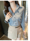 Chic striped blouse for office elegance, featuring a turn-down collar and single-breasted closure, perfect for professional w