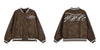 Chic Embroidered Leather Baseball Jacket in Black - Stylish collar, zipper placket, and embroidered design for men's casual fashion.