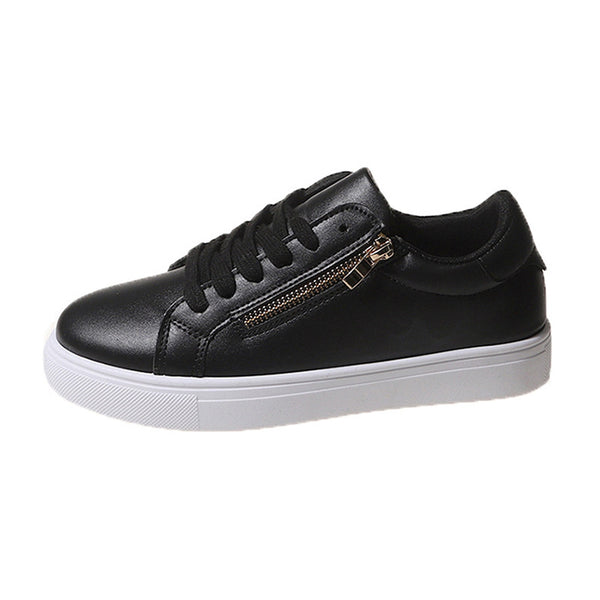 Chic Large Size Flat Sneaker in Black or White for Fashion-Conscious Ladies with Cotton Lining and Synthetic Leather Design.