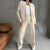 Chic Zip-Up Jacket & Wide Leg Pants Set in Milky White, Pure White, Black, and Pink - Women's Stylish Sports Outfit.