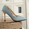 Peacock blue pearl studded heels, chic mid-height pumps with pointed toe, perfect for stylish events and parties.