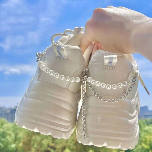 Sleek White Elevator Sneakers with Ribbon Accent