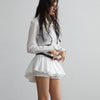 Chic White Ruffled Short Skirt - Elegant & Versatile Women's Fashion.